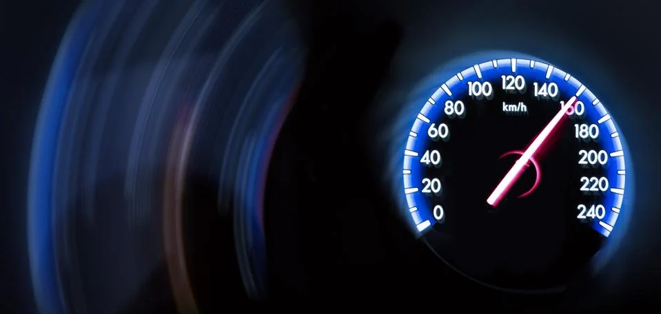 Car Speedometer on dark background Stock Photos