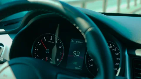 Car speedometer in ECO mode for reduced emissions showing rising speed and Stock Footage 311818762