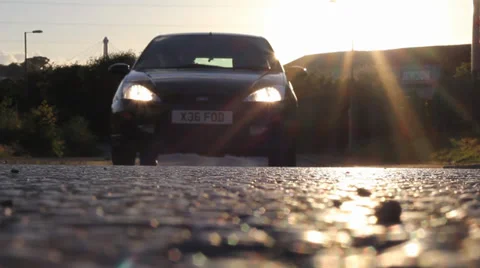 Car speeds over camera Stock Footage 38711135