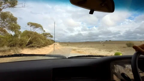 Car sprayed with mud when 4x4ing 스톡 동영상 112159551