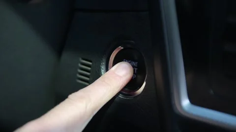 Car start stop. pushing the start button Stock Footage 138206581