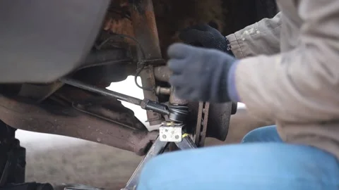 Car steering repair, installation of steering tips and rods. Stock Footage 194449028