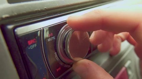 Car stereo close up, adjusting volume Stock Footage 115496627