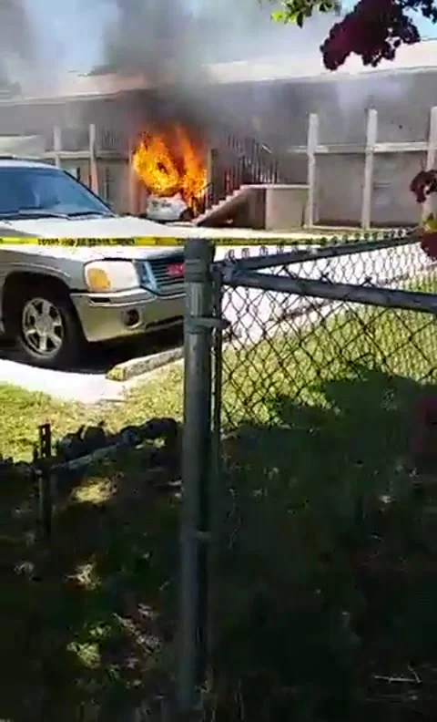 Car Still on Fire With Man Inside, Fort Pierce, Florida, USA - 04 Jul 2017 Stock Footage 205294389
