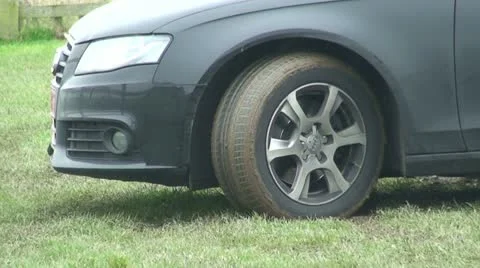 Car stuck in the mud (2) Stock Footage 12730570