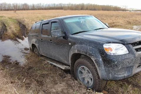 The car is stuck in the mud Stock Photos