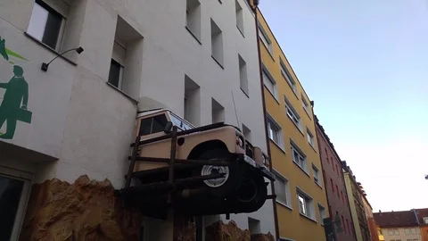 Car stuck in wall 動画素材 81147557