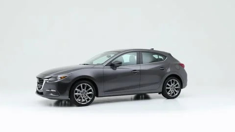 Car in studio Florett Silver Metallic 2018 Mazda MAZDA3 Grand Touring Stock Footage 159384041