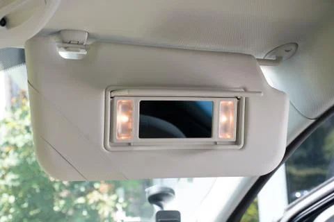 Car sun visor with mirror Stock Photos