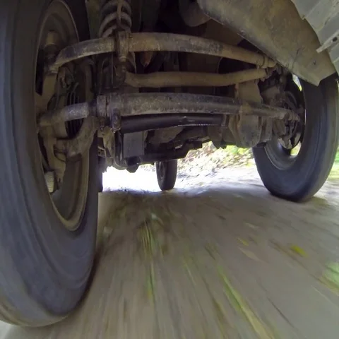 Car suspension system for reducing vibration when driving. High Definition Stock Footage 69485305