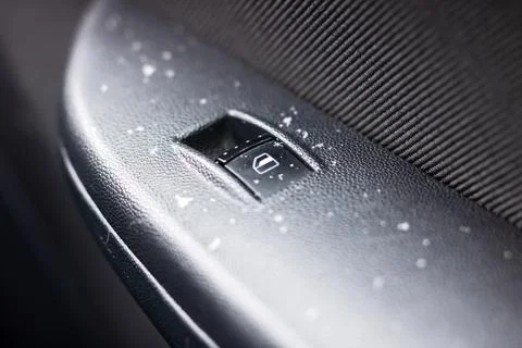 Car switch with dusty surface, Macro shot of vehicle switch showing textured Photos