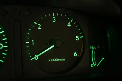 Car tachometer at night 스톡 사진