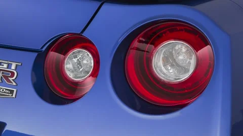Car tail light close up Bayside Blue 2020 Nissan GT-R Premium 50th Anniversary Stock Footage 160106281