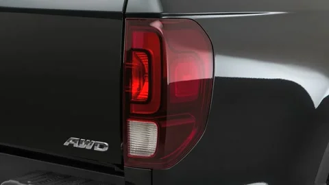 Car tail light close up Crystal Black Pearl 2017 Honda Ridgeline Black Edition Stock Footage 159900870