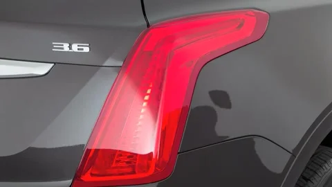 Car tail light close up Dark Granite Metallic 2017 Cadillac XT5 Premium Luxury Stock Footage 159895268