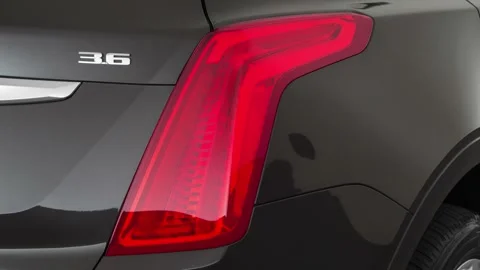 Car tail light close up Dark Granite Metallic 2018 Cadillac XT5 Premium Luxury Stock Footage 159975247
