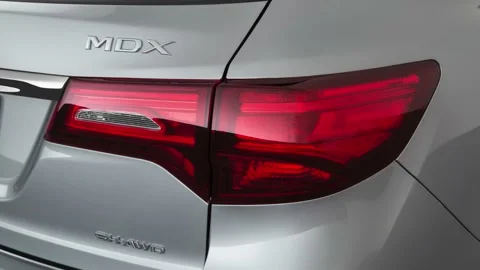 Car tail light close up Lunar Silver Metallic 2019 Acura MDX with A-Spec Package Stock Footage 160069014