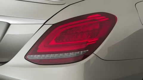 Car tail light close up Mojave Silver Metallic 2019 Mercedes-Benz C-Class C300 Stock Footage 160040521