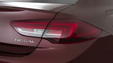 Car tail light close up Rioja Red Metallic 2018 Buick Regal Sportback Preferred Stock Footage 159995630