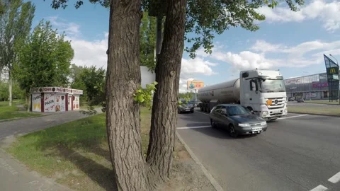 A car tanker passes through the intersection Stock Footage 131093114