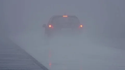 Car Test Site - driving in thick fog  - bad sight Stock Footage 79678541