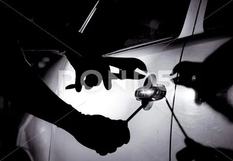 Car Thief Using A Tool To Break Into A Car Stock Images Page Everypixel