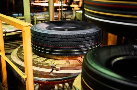 Car tire after the vulcanization process. Stock Photos