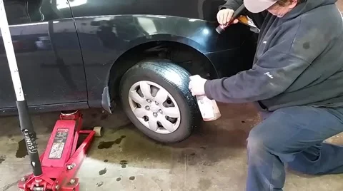 Car Tire Being Sprayed Video stock 45588811