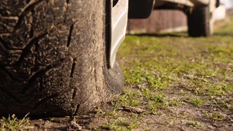 The car tire is flat. Stock Footage 329793771