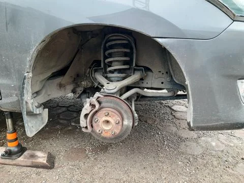 Car Tire Replacement Process Fotos de archivo