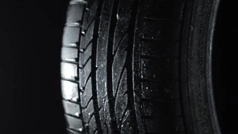 Car tire is spinning Stock Footage 154427328