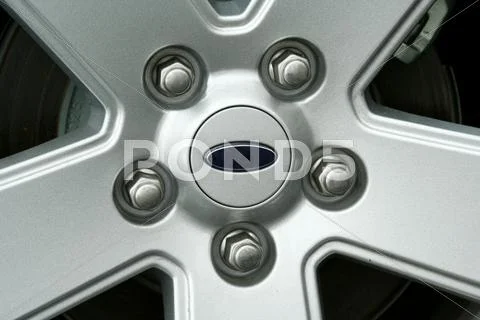 Car tire wheel and lug nuts Stock Photos