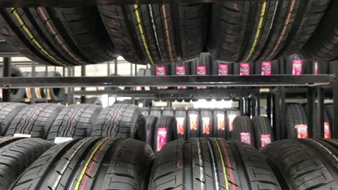 Car tires background video in workshop Stock Footage 212085354