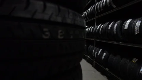Car Tires At Warehouse In Tire Store Stock Footage