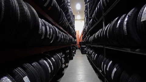 Car Tires At Warehouse In Tire Store Stock Footage