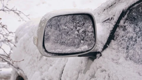 Car on top covered with snow and ice closeup Stock Footage 103473755
