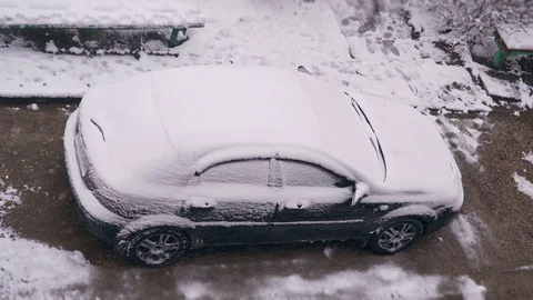 Car on top covered with snow Stock Footage 103473552