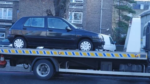 The car is on the tow truck. 動画素材 84042012