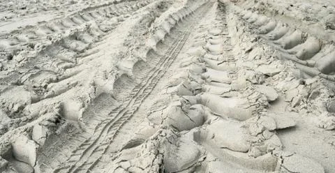 Car traces on sand Stock Photos
