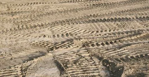 Car traces on sand Stock Photos
