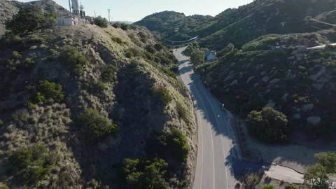 Car Tracking on Winding Raod Simi Valley Greater Los Angeles Aerial Footage Stock-Footage 335348175