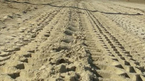 Car tracks at beach 1 Stock Footage 8984184