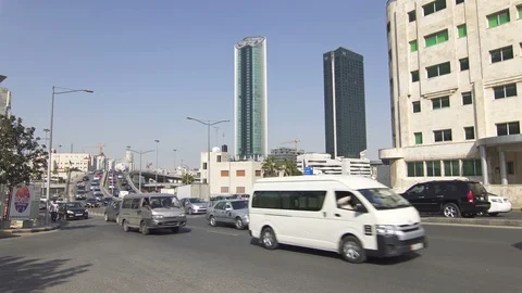 Car traffic in Abdali district, a modern business district of Amman Stock Footage 111362685