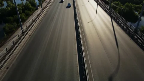 Car traffic against the backlight Stock Footage 165323761