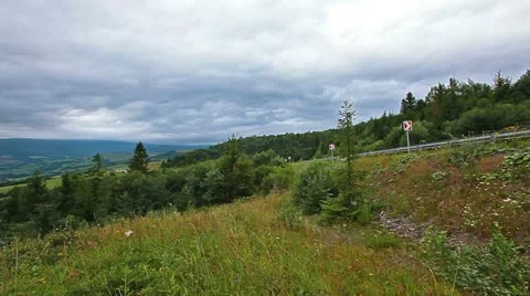 Car traffic on the background of mountain scenery Stock Footage 11961427