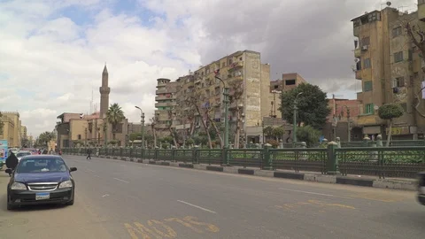Car traffic in central Cairo, Egypt. Panning right. Stock Footage 126126949