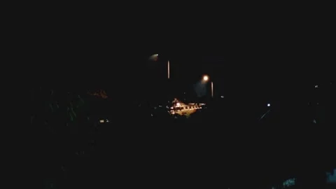 Car traffic on a dark night Stock Footage 296360696