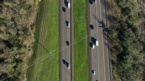 Car Traffic driving down Interstate Highway from above Stock Footage 145385599