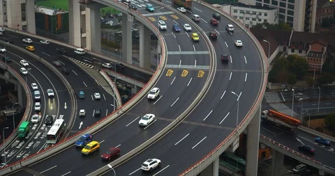Car traffic moving on multi row Spiral Nanpu bridge in the evening, Shanghai Stock Footage 107810970