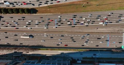 Car traffic on a multi-lane freeway in Atlanta. Interstate I-75, Georgia. Aerial Stock Footage 260303216